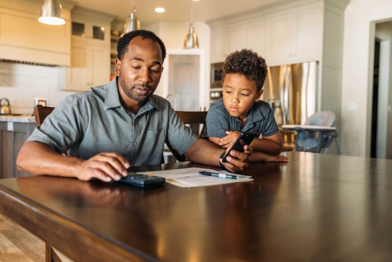 Father Teaching Son Finance Lessons