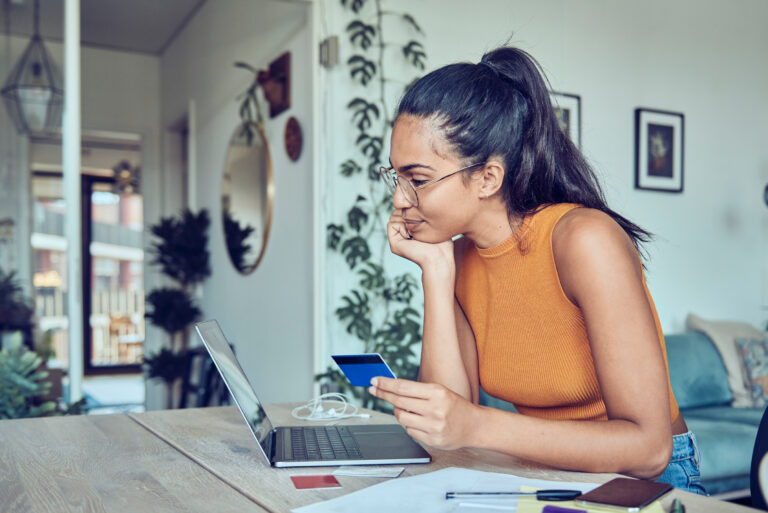 Woman Paying With Credit Card