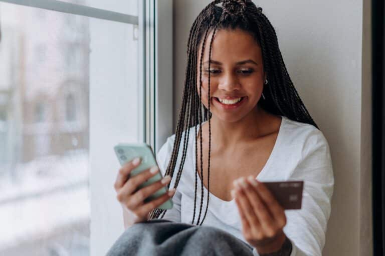 Woman Using A Credit Card