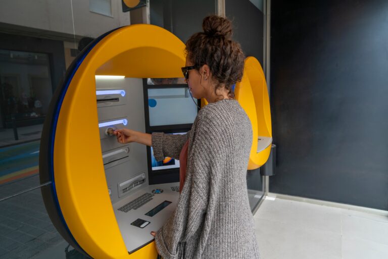 Woman Using Atm